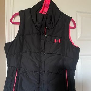 Ladies medium, semi/fitted, black UNDER ARMOUR puffer vest. Lined in hot pink.